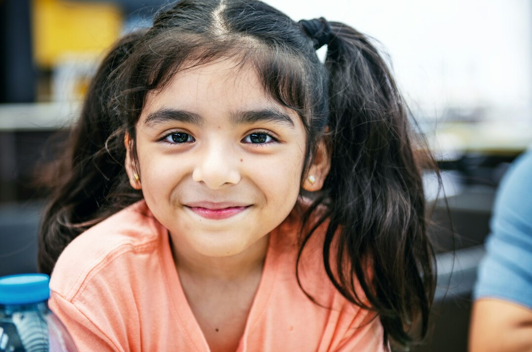 Portrait of a smiling woman with brown hair